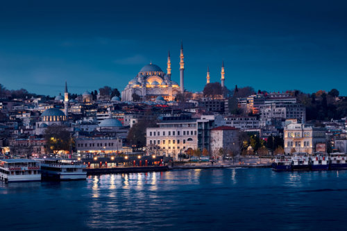 Istanbul cityscape at night with Suleymaniye mosque, Turkey