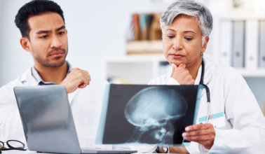 surgeon team, review picture with anatomy in hospital