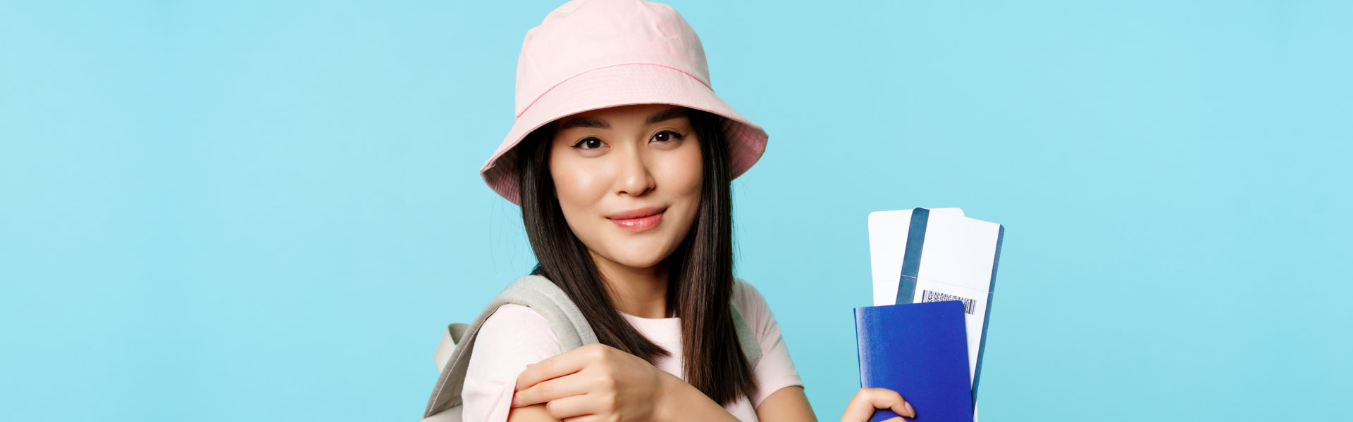 a female tourist smiling