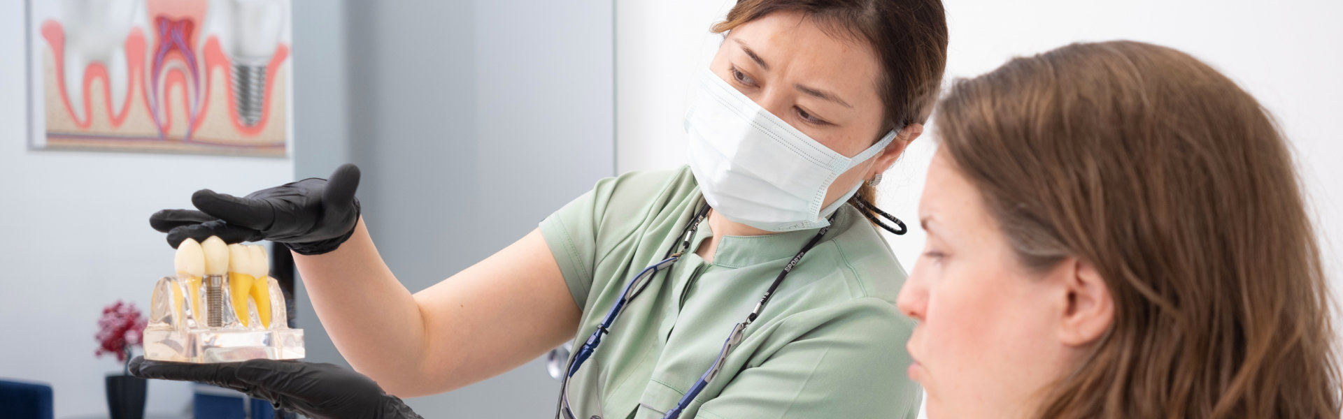 doctor showing results of dental checkup